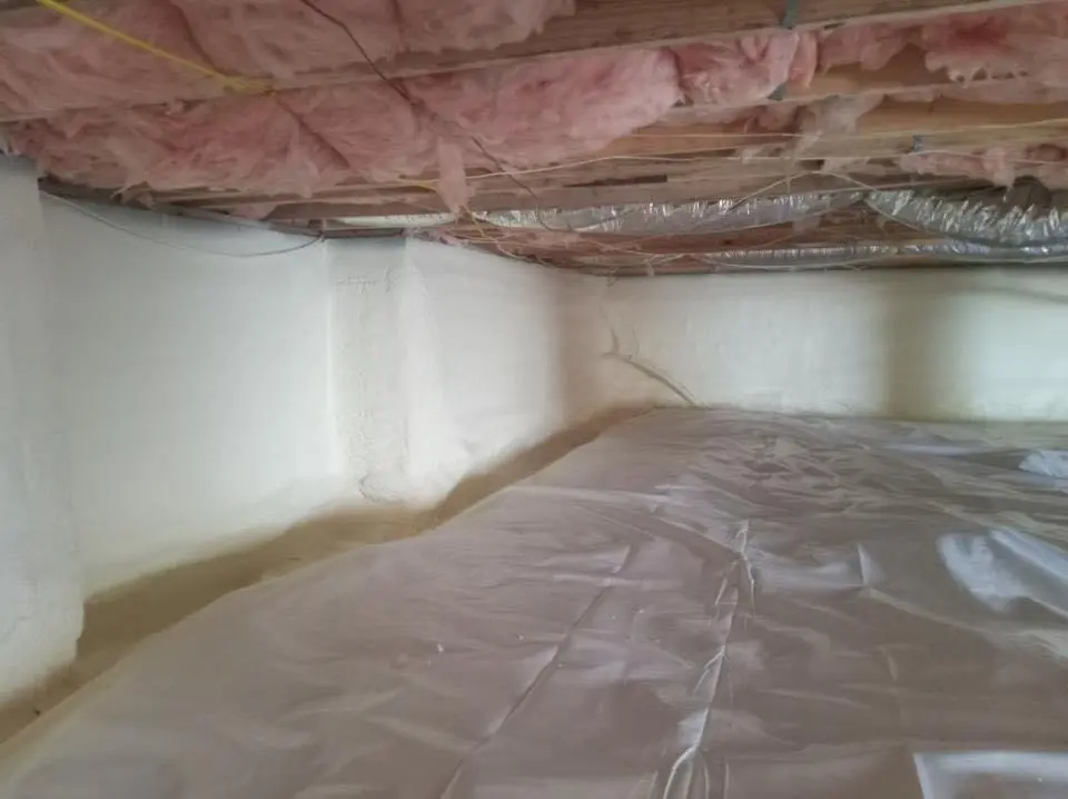 Crawl space encapsulation with closed-cell spray foam for Commercial Roof Restoration in West Memphis